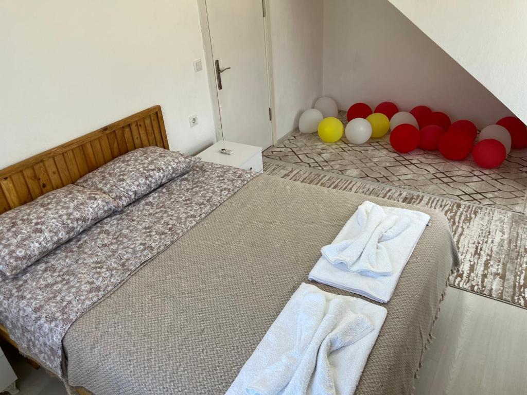 Postel nebo postele na pokoji v ubytování Galabaapart