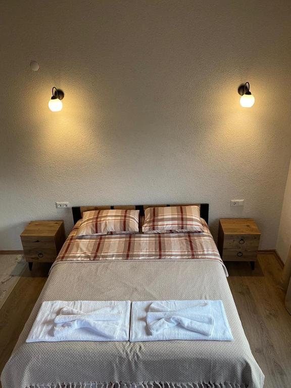 Postel nebo postele na pokoji v ubytování Galabaapart