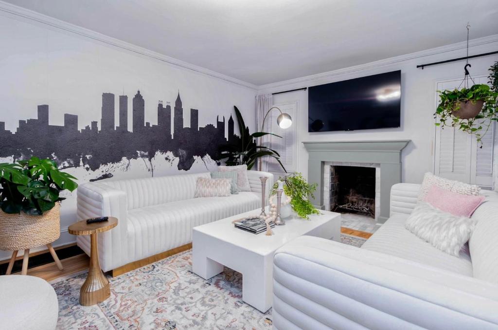 Giường trong phòng chung tại The Atlanta Cottage