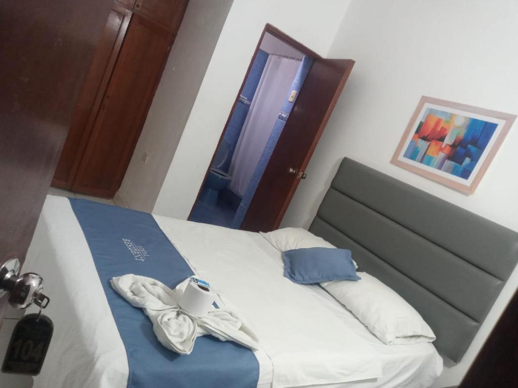 Postel nebo postele na pokoji v ubytování Hostal Resident Piura - Suite plaza
