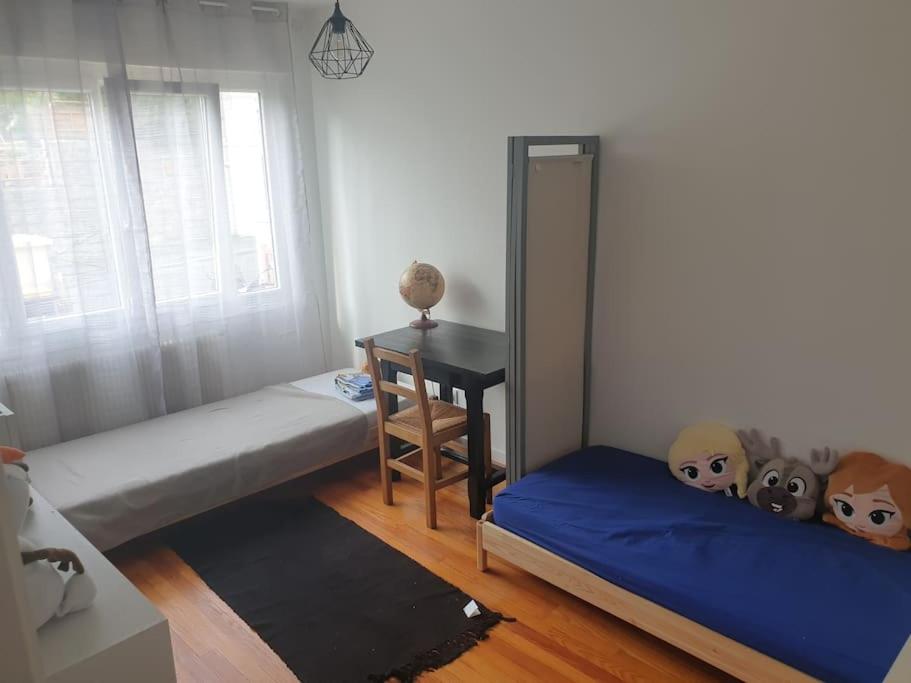 Postel nebo postele na pokoji v ubytování Petite maison individuelle à 30min de Paris