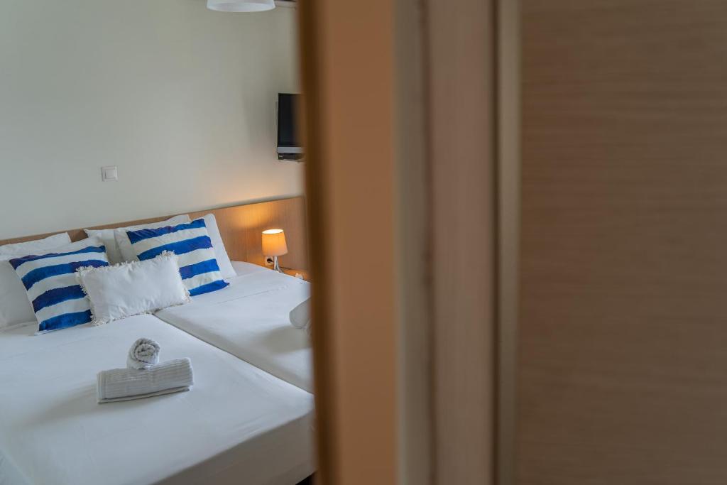Posteľ alebo postele v izbe v ubytovaní Elounda Sunrise Villa