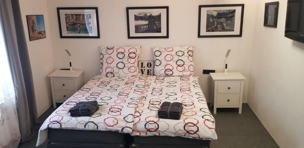 Postel nebo postele na pokoji v ubytování Hotel Adriana