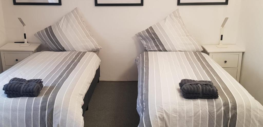 Postel nebo postele na pokoji v ubytování Hotel Adriana
