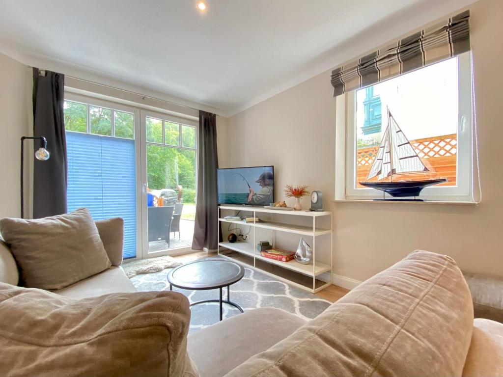 Et tv og/eller underholdning på Das Handtuchhaus - Wohnen im schmalsten Haus - Mittendrin