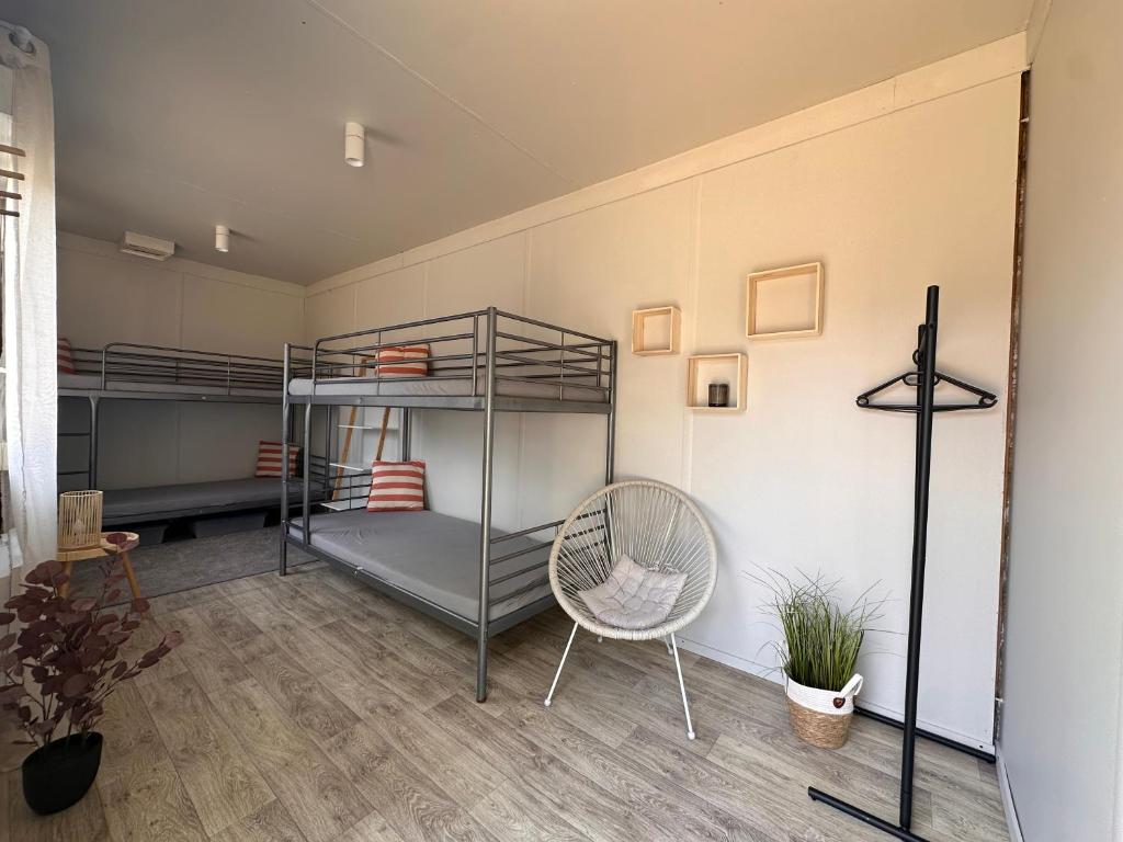 Postel nebo postele na pokoji v ubytování Camp Hostel