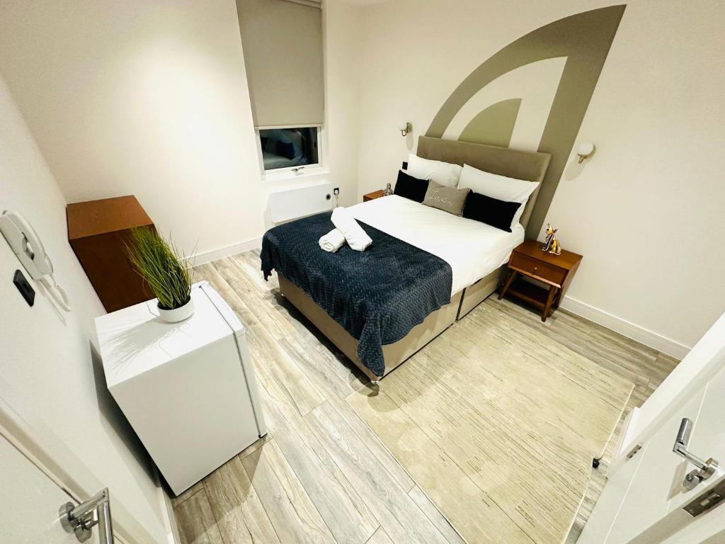 Кровать или кровати в номере Luxury Central London flats, perfect and ideal for tourists