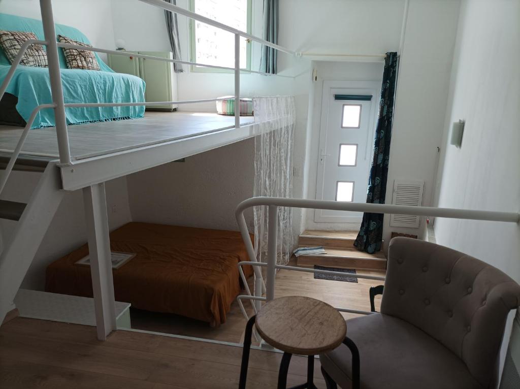 Postel nebo postele na pokoji v ubytování Grand studio duplex