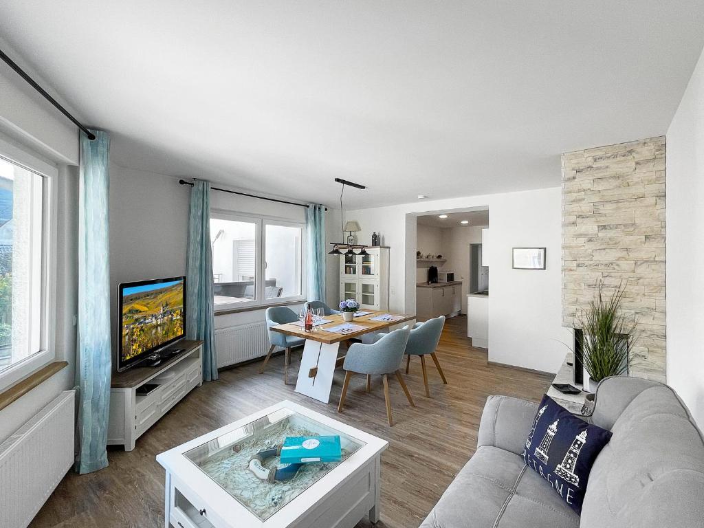 Et opholdsområde på Ferienhaus Ty Maya