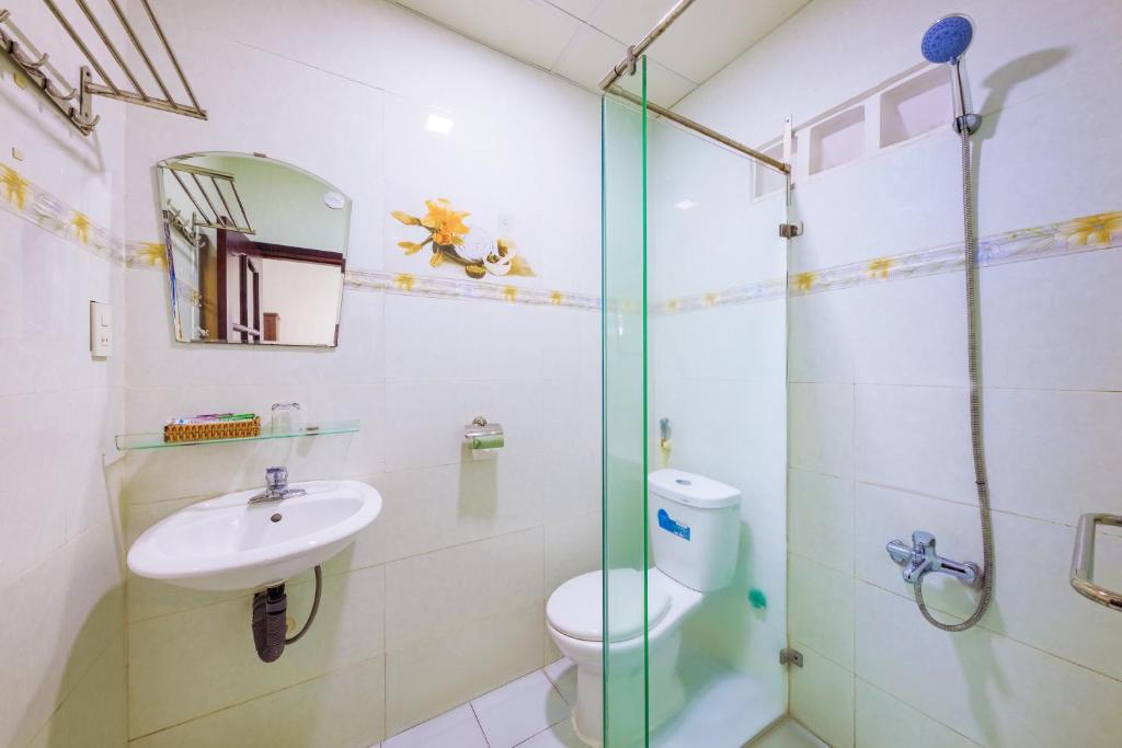 Koupelna v ubytování Mangolia Hotel