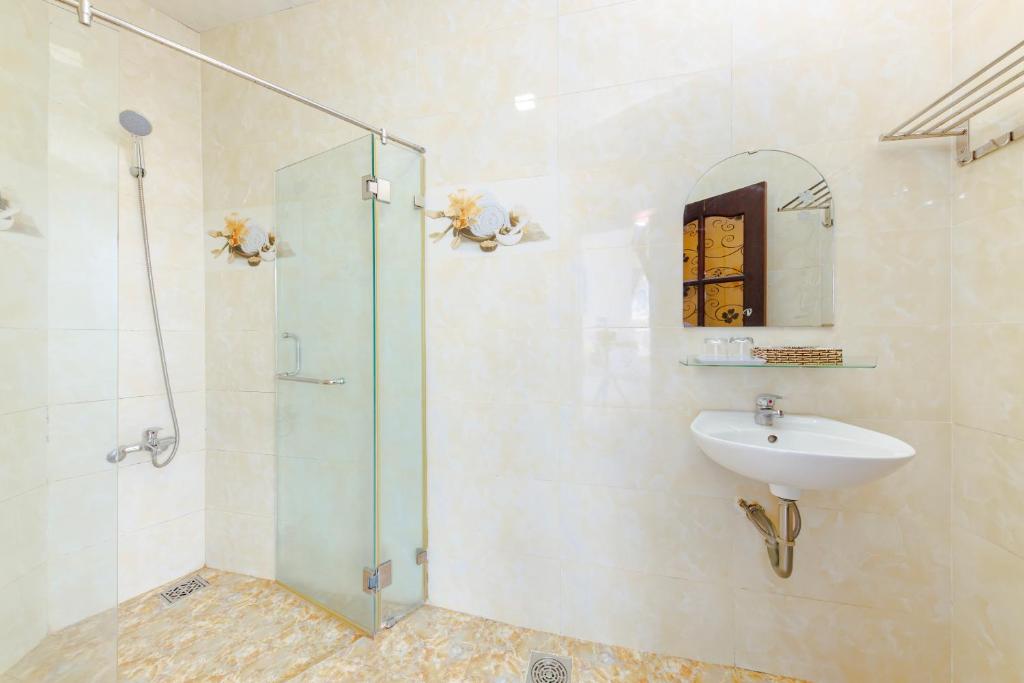 Phòng tắm tại Mangolia Hotel