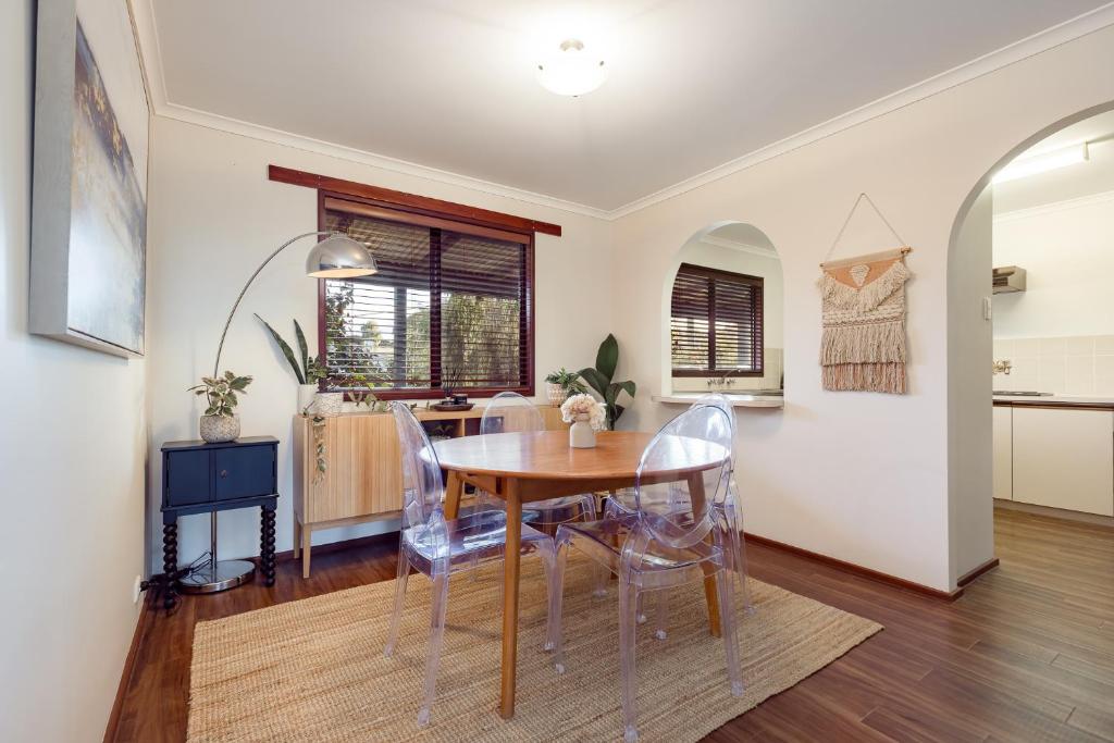 a kitchen and dining room with a table and chairs at Roo With A View By Swan Bnb Management in Preston Beach