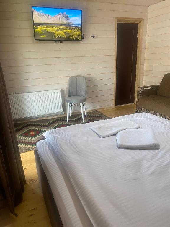 Postel nebo postele na pokoji v ubytování Chalet Ivanna