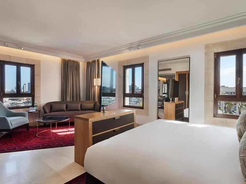 Postel nebo postele na pokoji v ubytování The Setai Tel Aviv, a Member of the leading hotels of the world