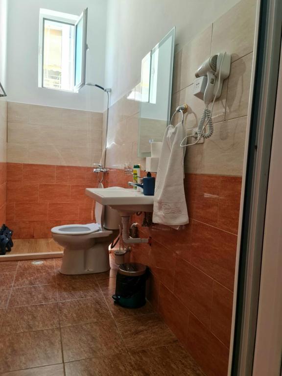 Koupelna v ubytování Hotel Brace