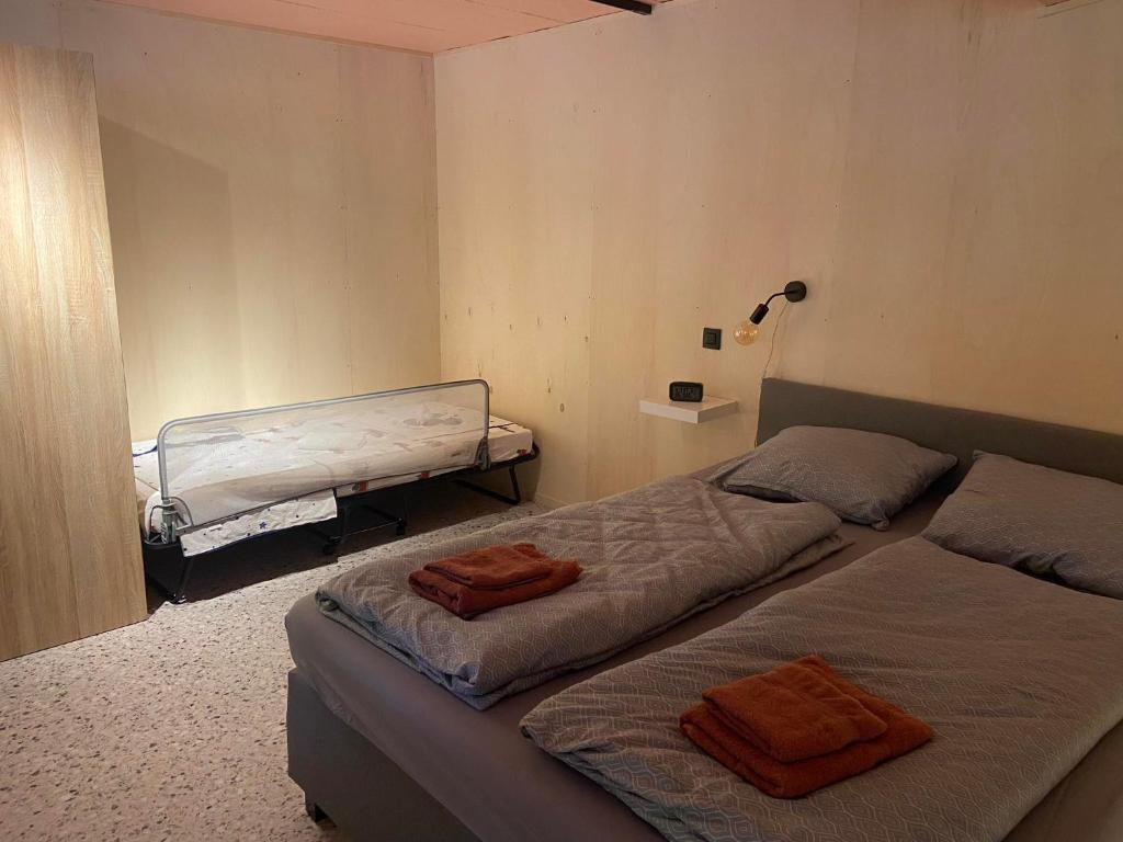 Postel nebo postele na pokoji v ubytování Guesthouse Sprinysem