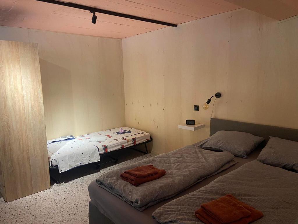 Postel nebo postele na pokoji v ubytování Guesthouse Sprinysem