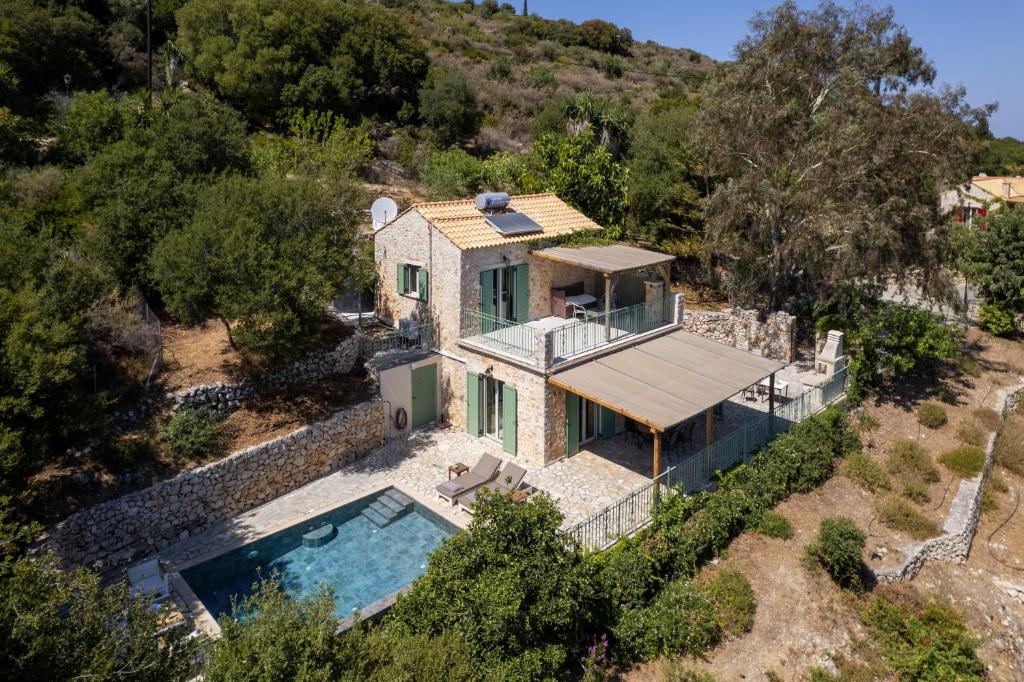 an aerial view of a house with a swimming pool at Villa Sevastoula (formerly Villa Skalita) in Ratzaklíon