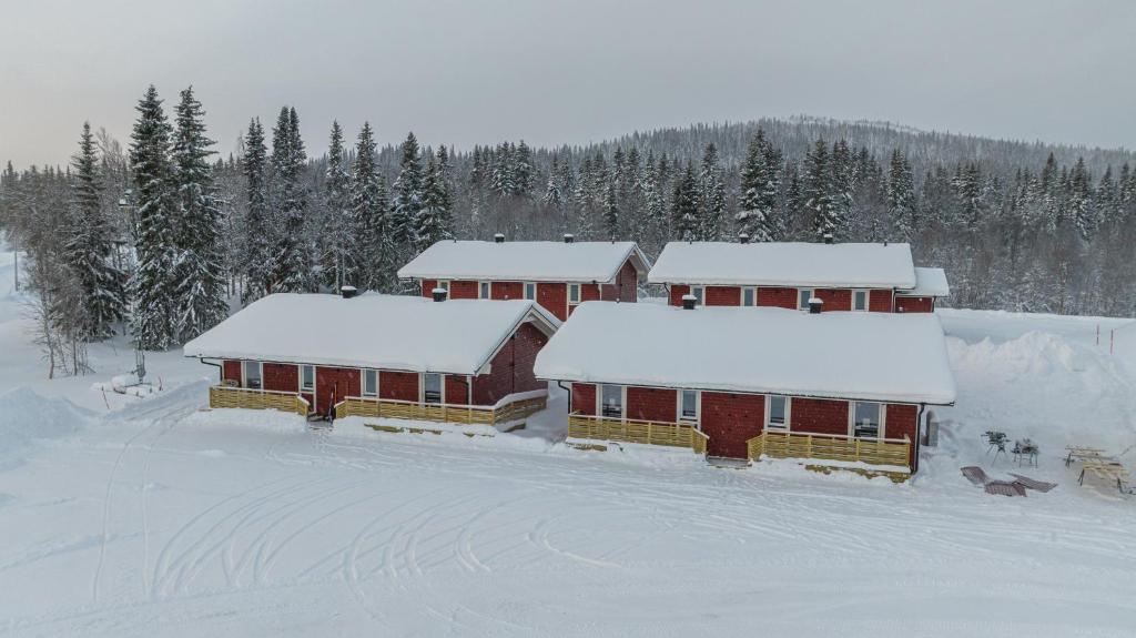 Marsfjäll Mountain Lodge Stugor i Saxnäs v zimě