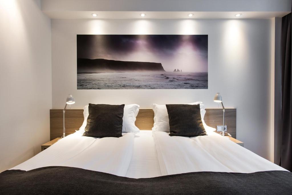 Postel nebo postele na pokoji v ubytování Storm Hotel by Keahotels