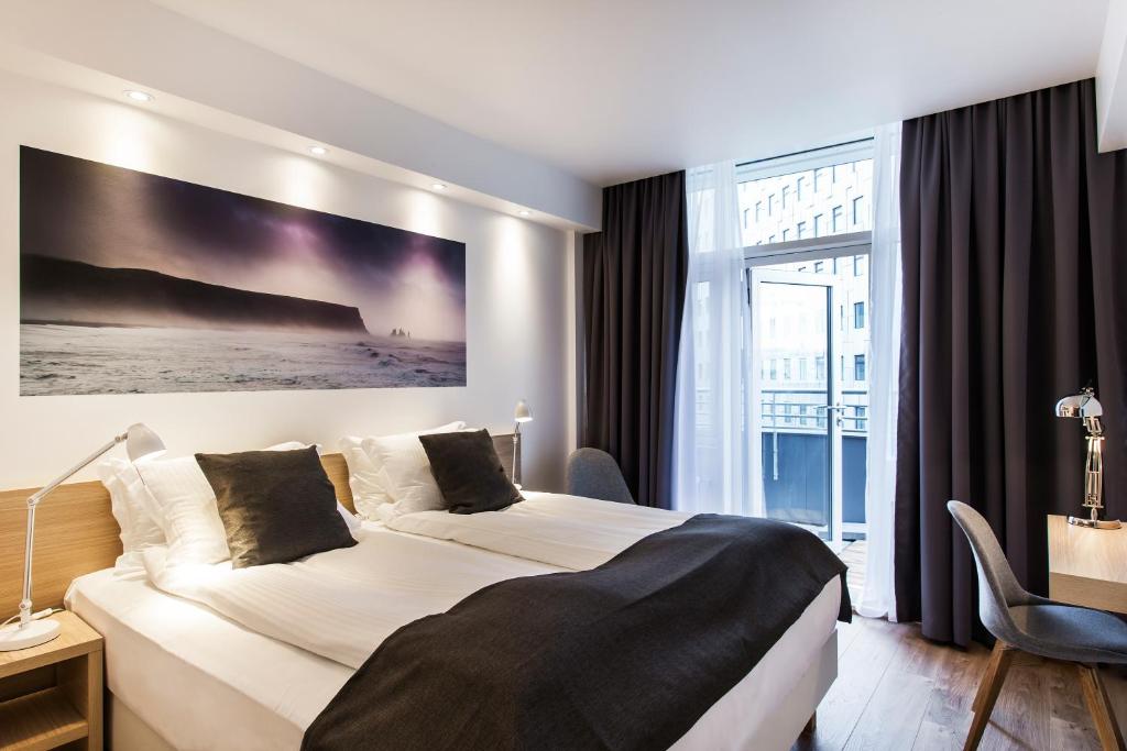 Postel nebo postele na pokoji v ubytování Storm Hotel by Keahotels