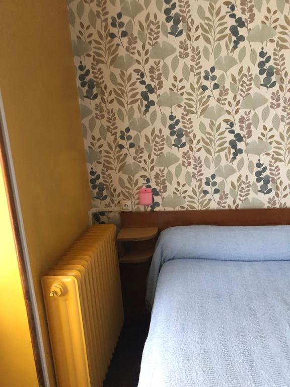Postel nebo postele na pokoji v ubytování Hotel Villa Plaisance
