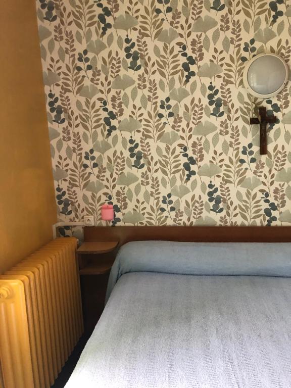 Postel nebo postele na pokoji v ubytování Hotel Villa Plaisance