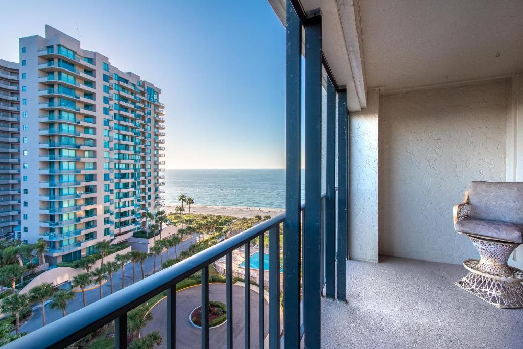 a balcony with a view of the ocean at Sand Key South Beach Condo #910 in Clearwater Beach