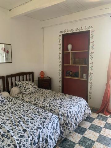 Postel nebo postele na pokoji v ubytování Chez Bacchus