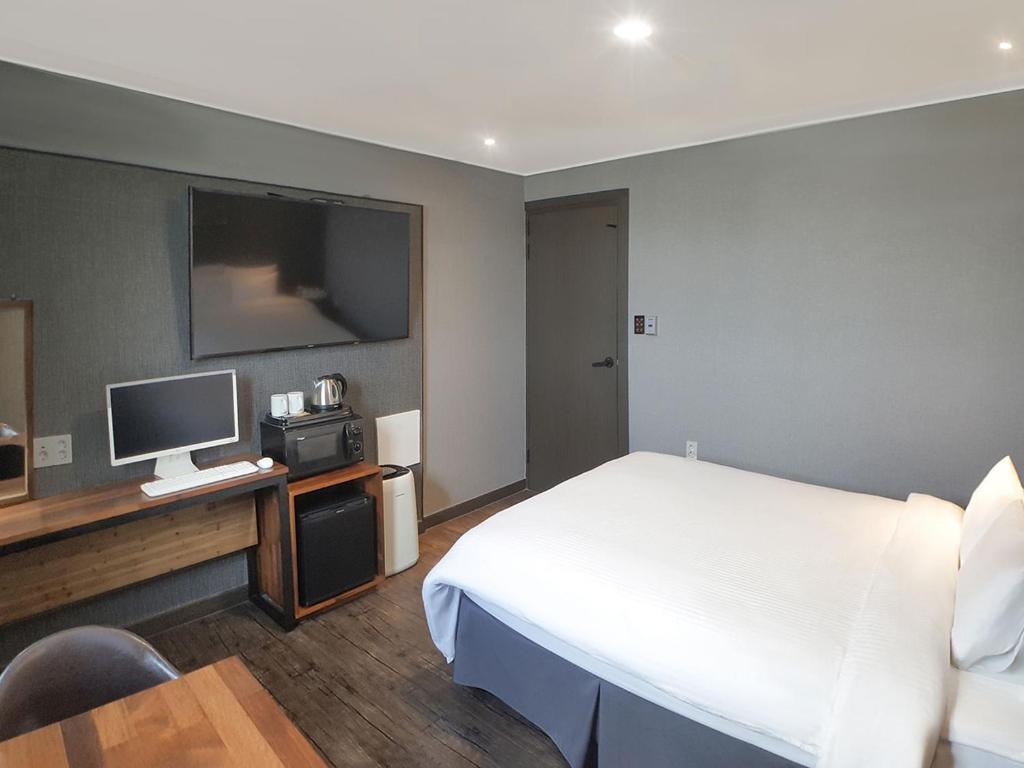 Postel nebo postele na pokoji v ubytování Pension Inn