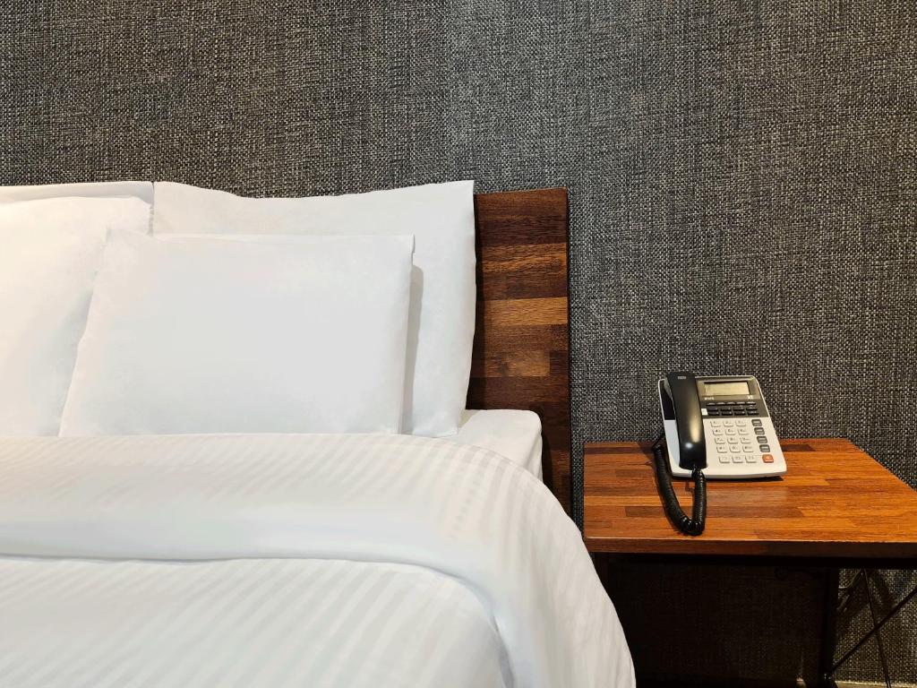 Postel nebo postele na pokoji v ubytování Pension Inn