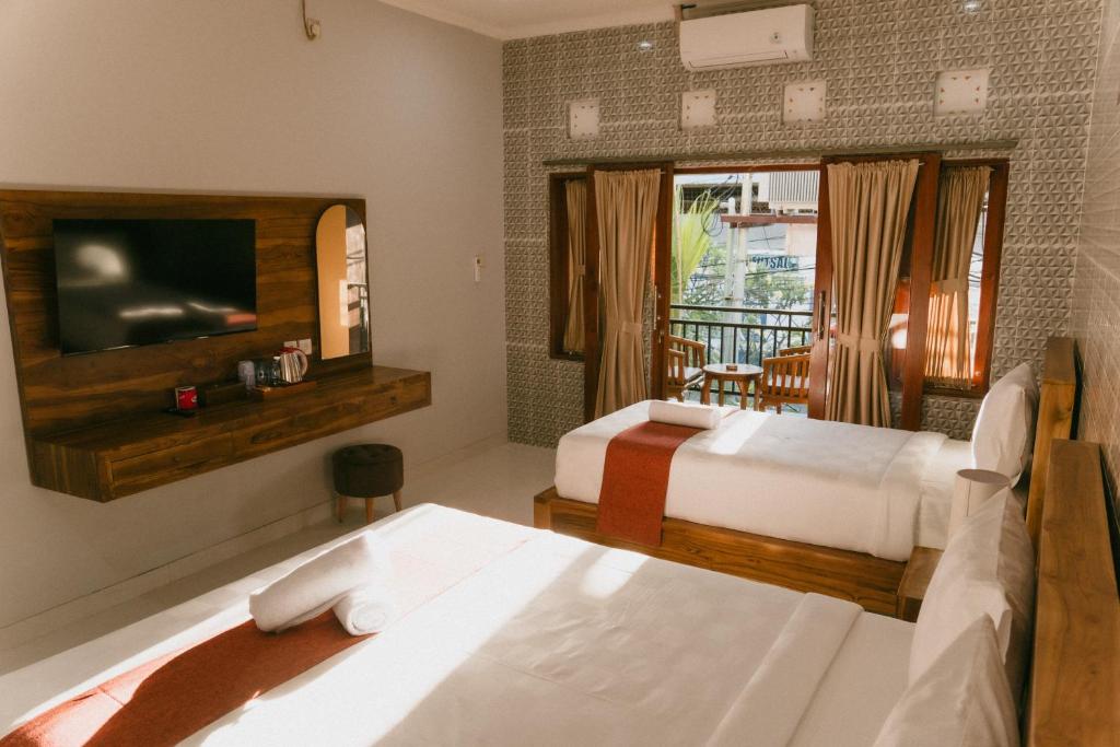 Postel nebo postele na pokoji v ubytování Dara House