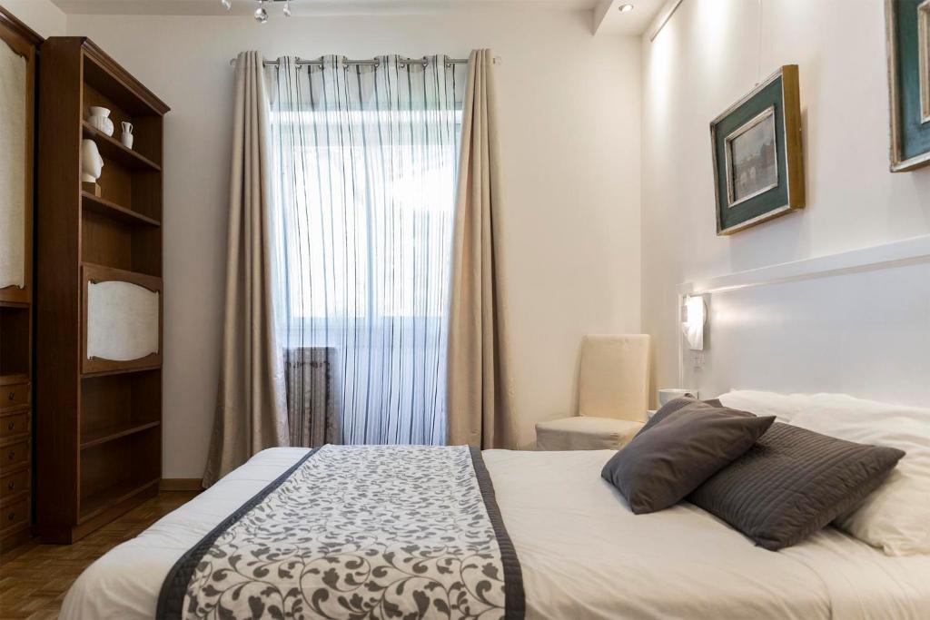 Posteľ alebo postele v izbe v ubytovaní Dulcis In Vatican b&b