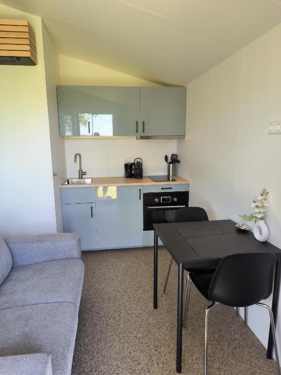 Kuchyň nebo kuchyňský kout v ubytování Mariafarm Chalets