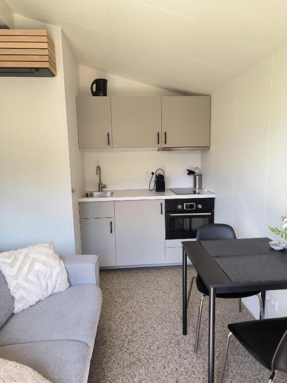 Kuchyň nebo kuchyňský kout v ubytování Mariafarm Chalets