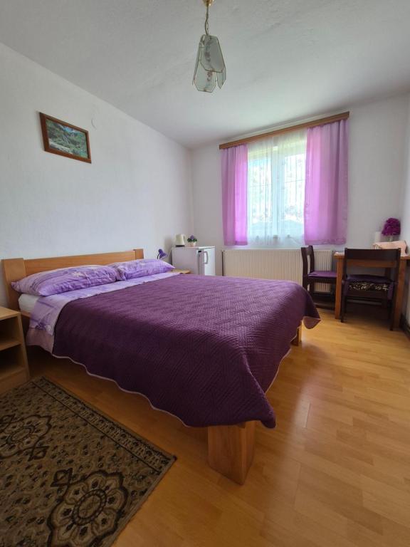Postel nebo postele na pokoji v ubytování Guesthouse Milka