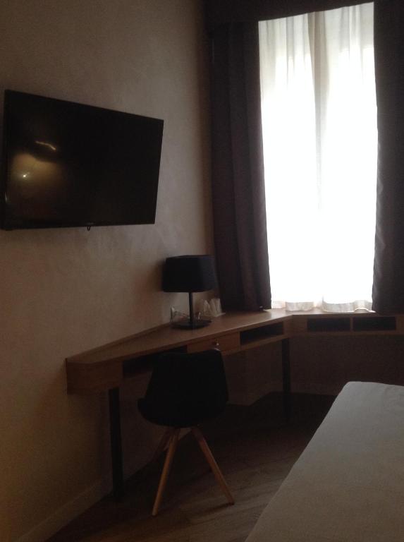 TV a/nebo společenská místnost v ubytování Hotel Elite