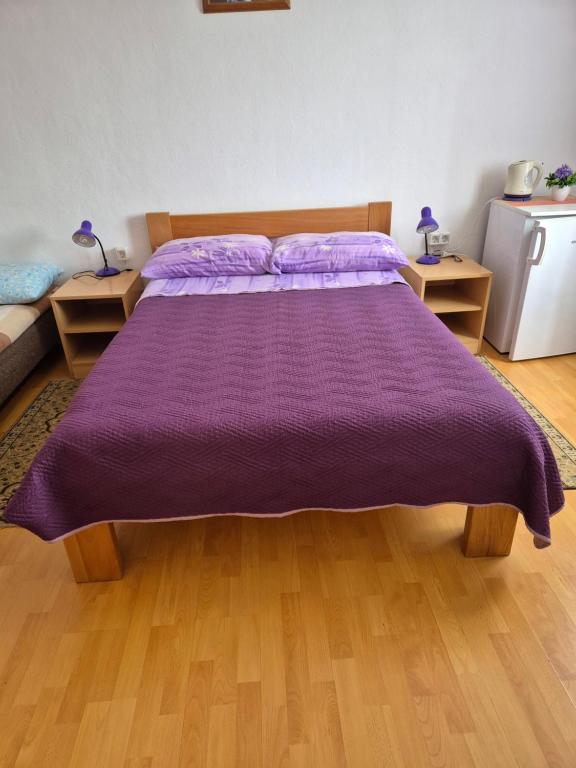 Postel nebo postele na pokoji v ubytování Guesthouse Milka