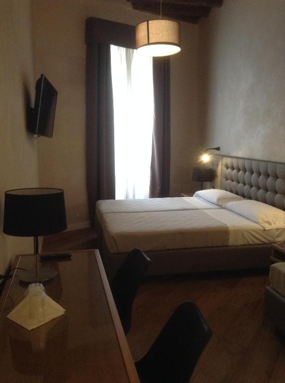 Postel nebo postele na pokoji v ubytování Hotel Elite