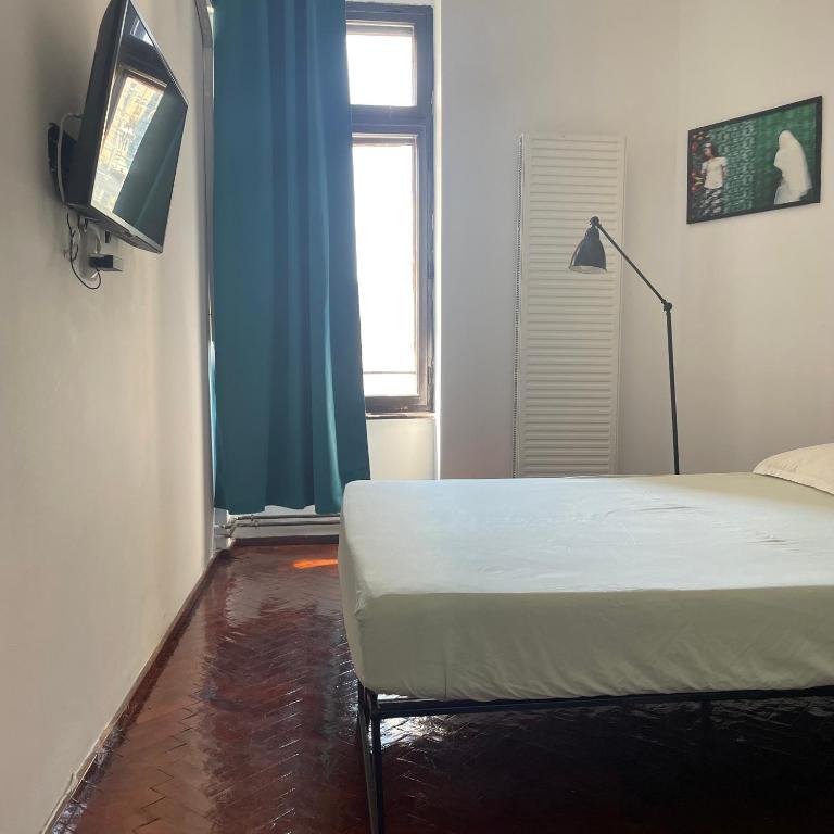 Postel nebo postele na pokoji v ubytování STudio54