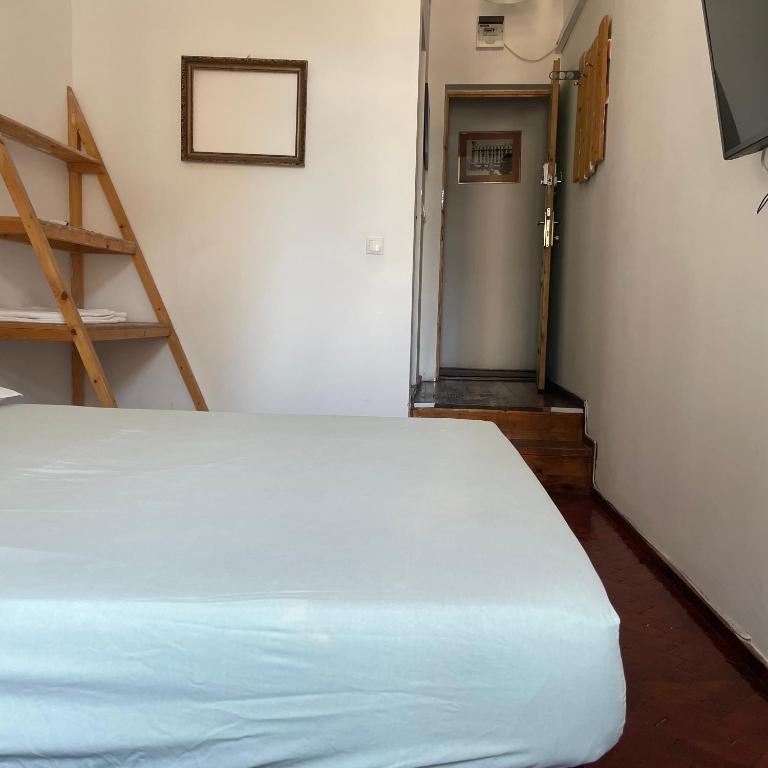 Postel nebo postele na pokoji v ubytování STudio54