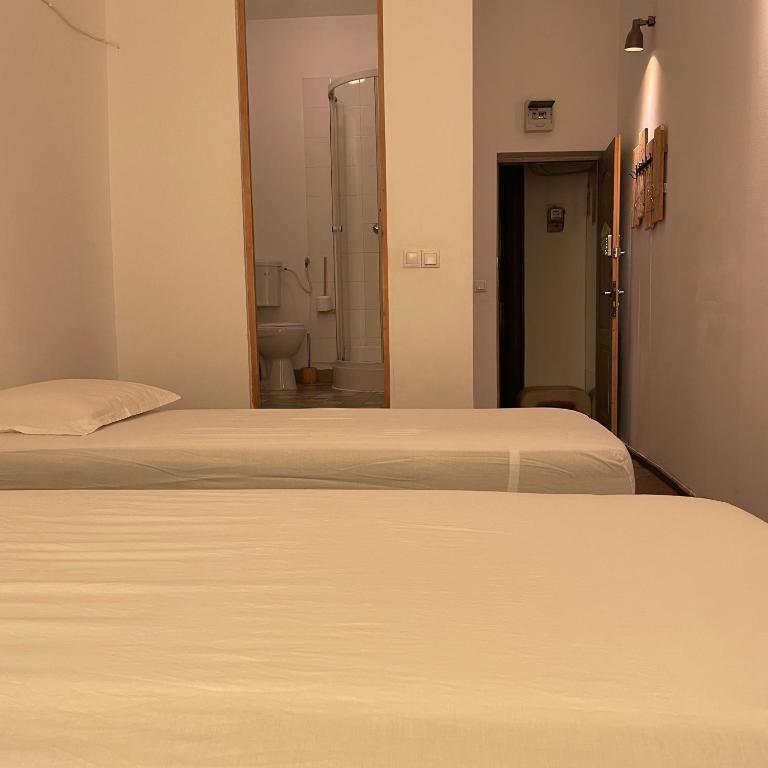 Postel nebo postele na pokoji v ubytování STudio54