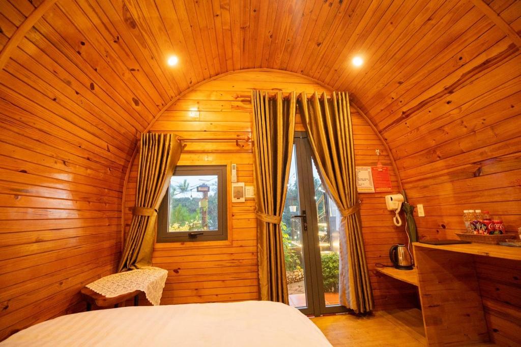 Letto o letti in una camera di Home of bong & gao