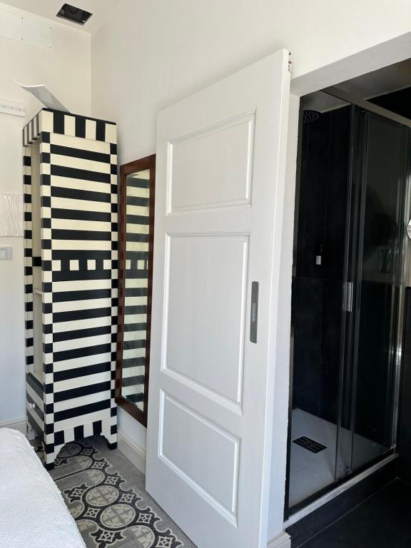 Postel nebo postele na pokoji v ubytování Domus Socolatae Cocoa Journey Tuscan Lifestyle B&B