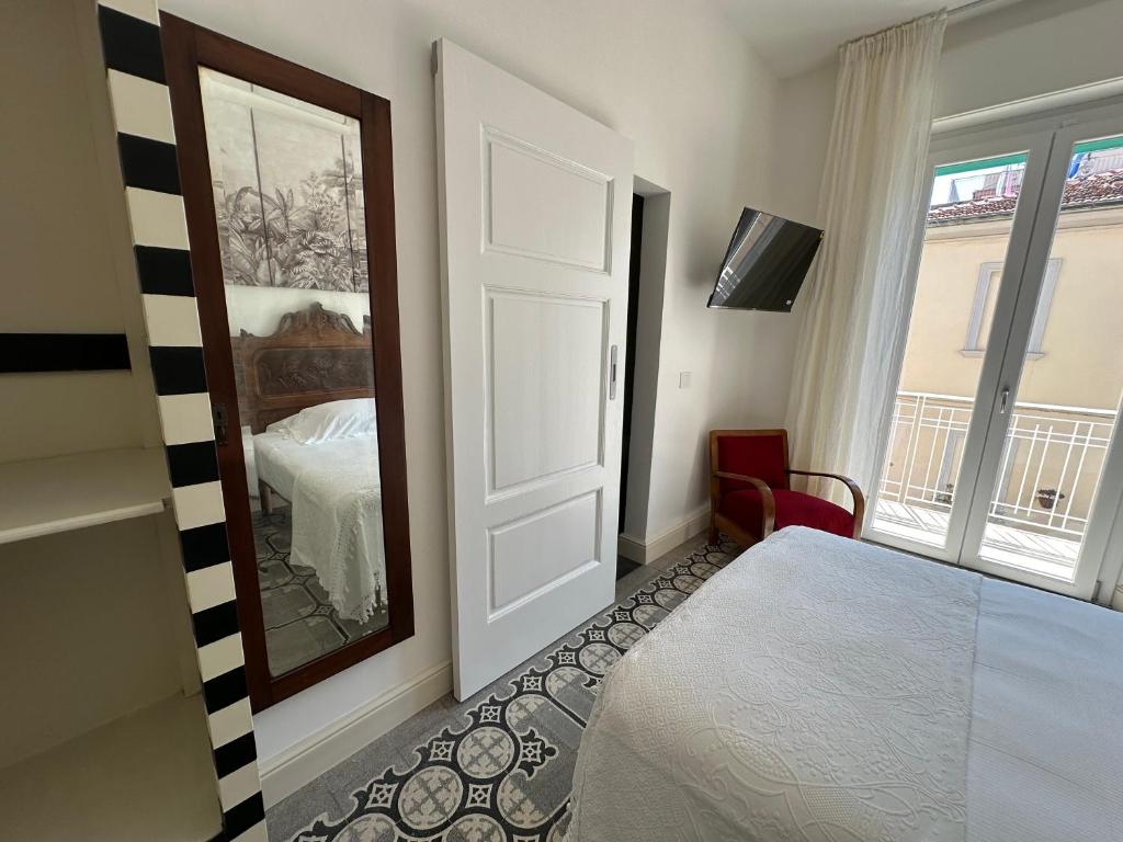 Postel nebo postele na pokoji v ubytování Domus Socolatae Cocoa Journey Tuscan Lifestyle B&B