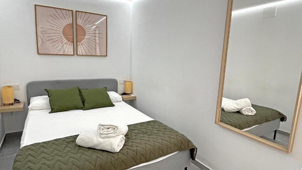 Postel nebo postele na pokoji v ubytování Mezquita Apartamento