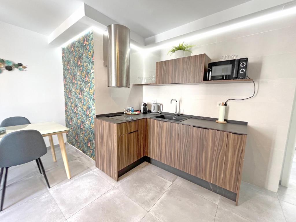 Kuchyň nebo kuchyňský kout v ubytování Mezquita Apartamento