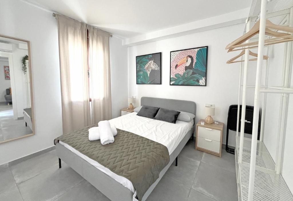 Postel nebo postele na pokoji v ubytování Mezquita Apartamento