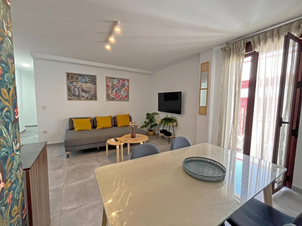 TV a/nebo společenská místnost v ubytování Mezquita Apartamento