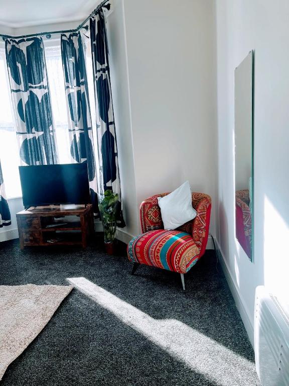 Posezení v ubytování Bay Wind Apartment